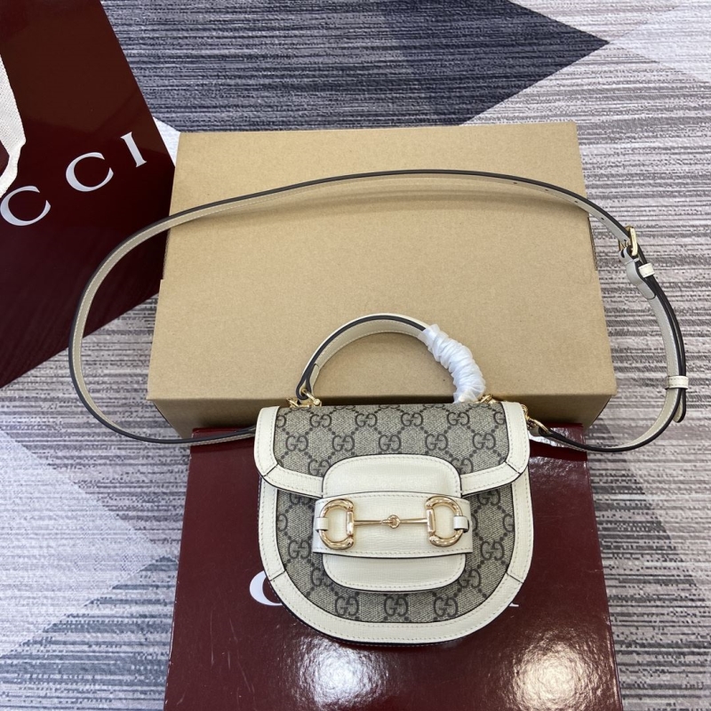 G*u*i top handle bags